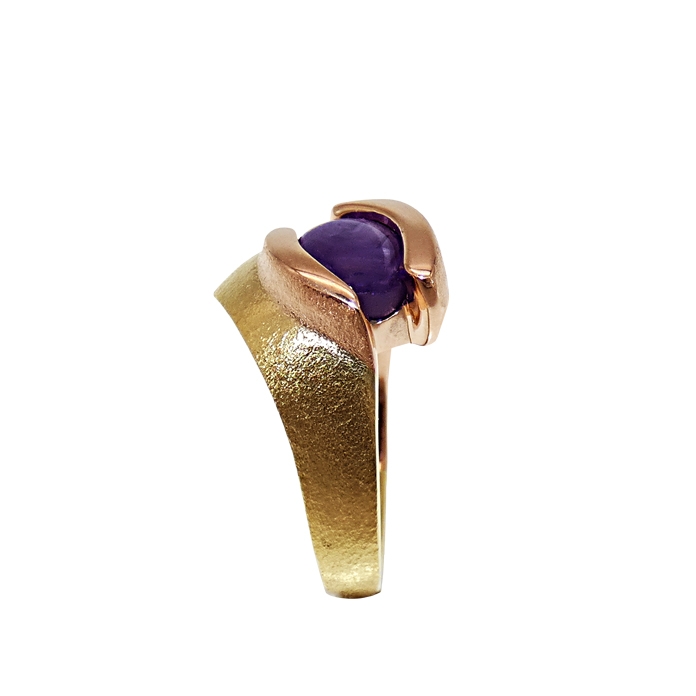 "ISIS" Channel Set Ladies Ring Item# KRYR-PPSS-1291 Designer: KC Classic Design Stone: Purple Star Sapphire = 4.12cts Setting: 18KYG/14KRG = 8.4 DWT